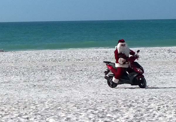chiles-xmas-party-santa-arrives-scooter-jg-121813