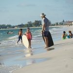 Red tide takes downhill slide, island business looks up