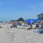 Island explodes with holiday revelers amid COVID-19