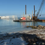 Work continues Jan. 7 on the Anna Maria City Pier walkway. The pier, including the T-End where Mote’s education center was located, has been closed since September 2024. Islander Photo: Robert Anderson